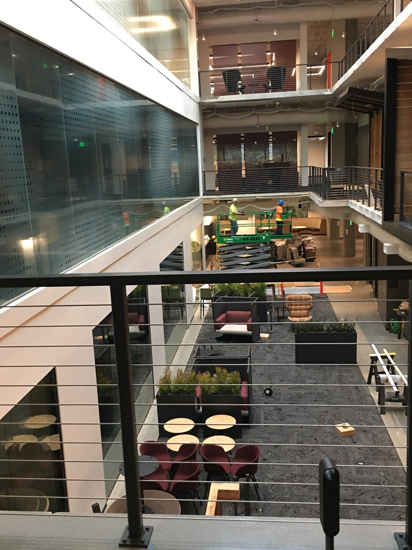 Building 122 finished. The same atrium the crew worked anchor by anchor.